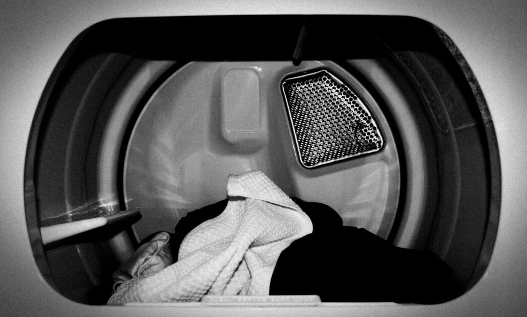 Woman Holds Dryer Repairman at Gunpoint