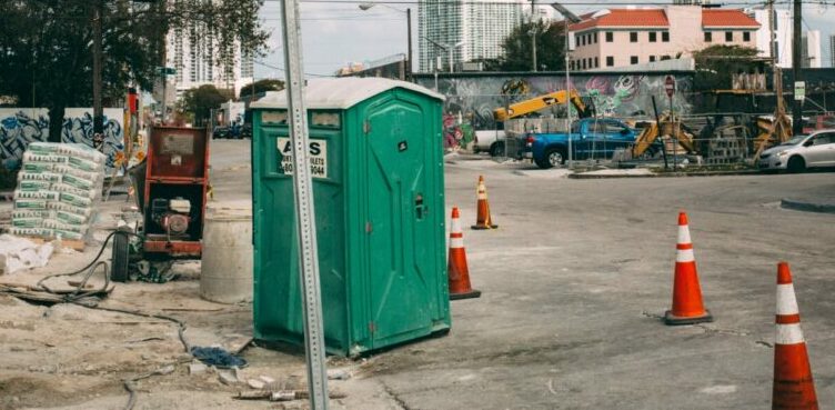 POLICE SHOOT MAN EXITING PORTA-POTTY